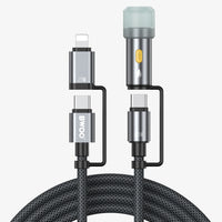 A Bwoo dual USB-C to Lightning cable with a black braided body, metallic silver connectors, and a translucent protective cap on the top end, shown against a light gray background with the cable coiled at the bottom.